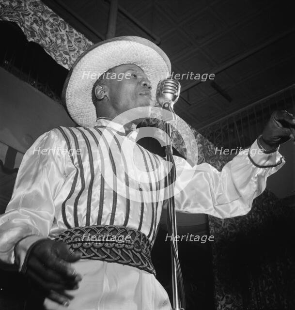 Portrait of Wilmoth Houdini, Renaissance Ballroom, New York, N.Y., ca. July, 1947. Creator: William Paul Gottlieb.