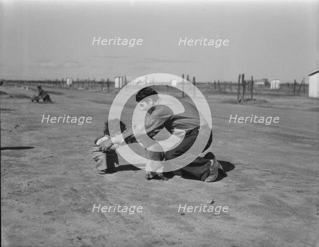 Drought refugees - penniless Oklahomans camped along highway, California, 1936. Creator: Dorothea Lange.