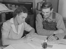 FSA borrowers on new farm keep account of their loan, Dead Ox Flat, Malheur County, Oregon, 1939. Creator: Dorothea Lange.
