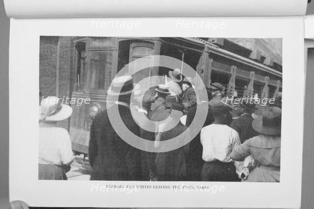 Negroes and Whites leaving the stock yards, 1922. Creator: Unknown.