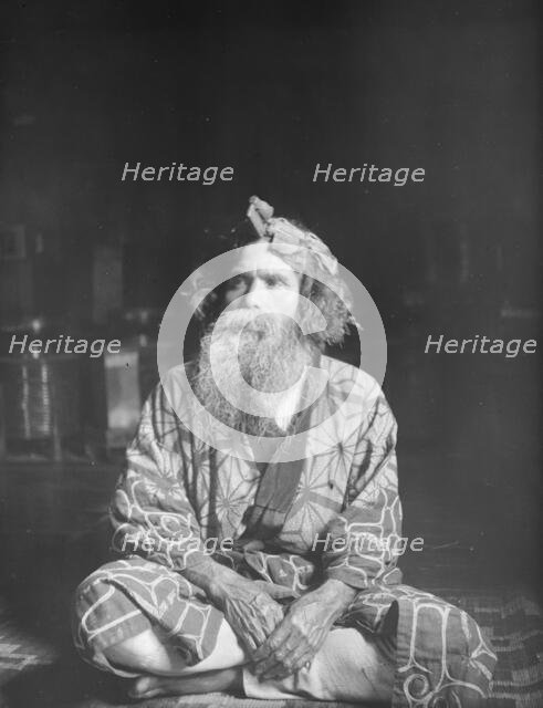 Ainu chief wearing a headdress, 1908. Creator: Arnold Genthe.