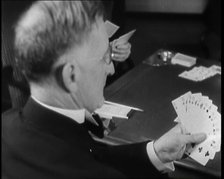 Man Playing Contract Bridge, 1930s. Creator: British Pathe Ltd.