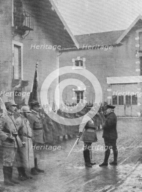 'M. Poincare a Verdun; le general Mangin, salue de l'epee le President de la Republique qui..., 1916 Creator: Unknown.