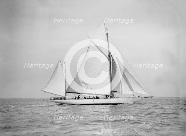 The yawl 'Nevada' under sail, 1911. Creator: Kirk & Sons of Cowes.