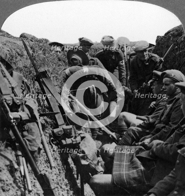 Stretcher bearers removing a wounded officer, World War I, 1914-1918.Artist: Realistic Travels Publishers