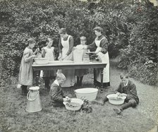 Pupils preparing food outdoors, Birley House Open Air School, Forest Hill, London, 1908. Artist: Unknown.