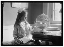 Child with birdcage, between 1910 and 1917. Creator: Harris & Ewing.
