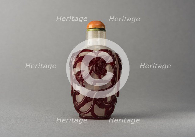 Clear glass snuff bottle with red overlay, China, Qing dynasty, 1644-1911. Creator: Unknown.