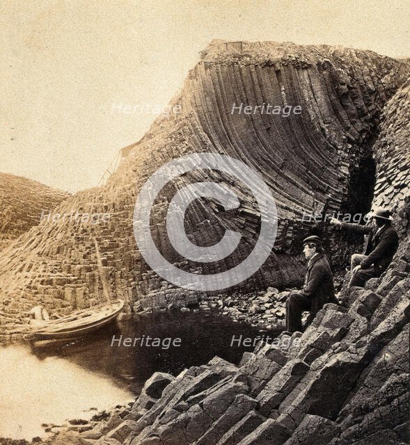 Staffa Island: two seated men admiring the basalt formations, c1880s. Creator: Unknown.