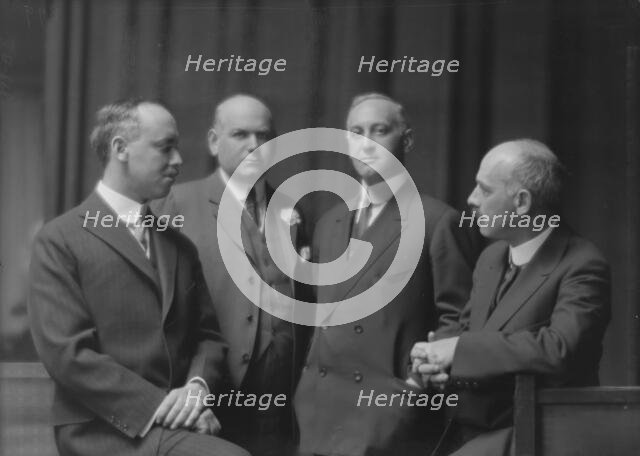 Esberg, Mr., Mr. Melton, and two unidentified men, portrait photograph, 1915 Jan. Creator: Arnold Genthe.