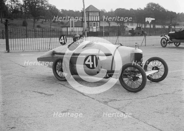 Sammy Davis in his AC at the JCC 200 Mile Race, Brooklands, Surrey, 1921. Artist: Bill Brunell.