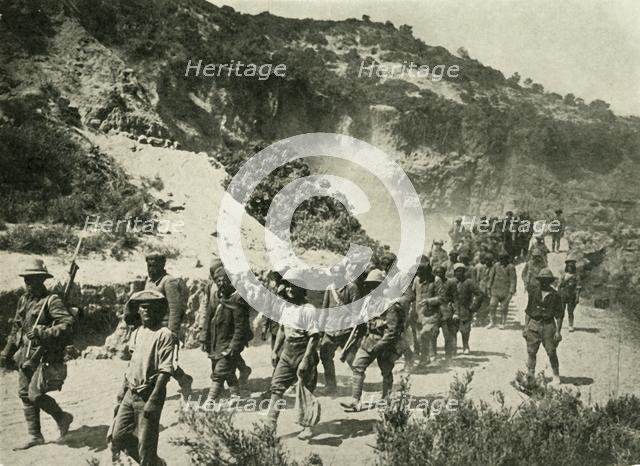 British troops with Turkish prisoners, First World War, 1915, (c1920).  Creator: Unknown.