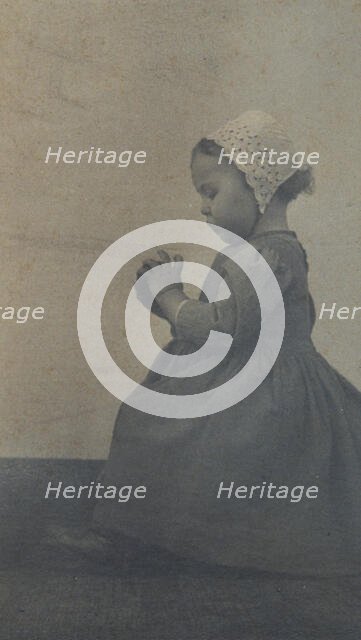 Child with apple, c1900. Creator: Ema Spencer.