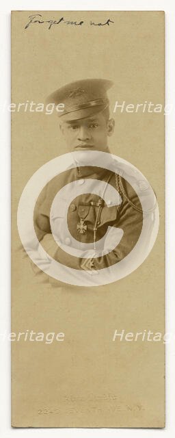 Photograph of Cpl. Lawrence McVey in uniform wearing the Croix de Guerre medal, ca. 1920. Creator: Alva Studio.