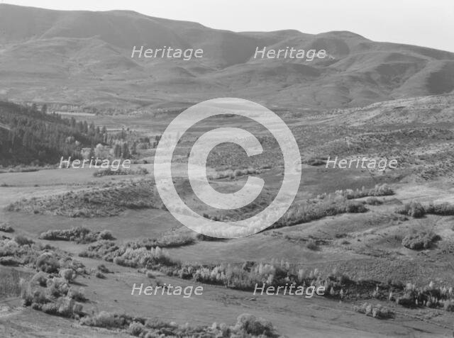 View of small valley, dry farming, Gem County, Idaho, 1939. Creator: Dorothea Lange.