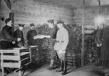 Giving Bread to British prisoners, between 1914 and c1915. Creator: Bain News Service.