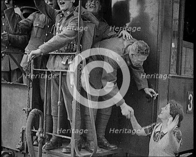Male Soldier Shaking Hands with Female Civilian, 1929. Creator: British Pathe Ltd.