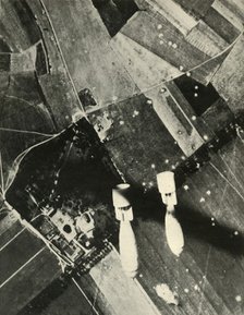 'More British Bombs on an Enemy-Held Aerodrome', 1939-1940, (1941). Creator: Unknown.