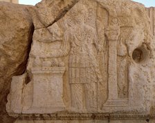 Relief depicting the god Aglibol, Temple of Bel, Palmyra, Syria, 2002.  Creator: Unknown.