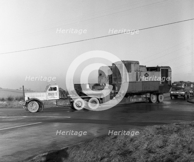 Early 1940s Diamond T truck pulling a large load, South Yorkshire, 1962. Artist: Michael Walters