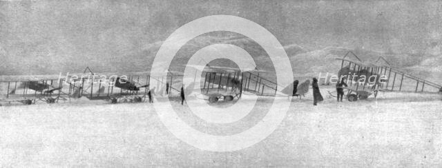 ''En campagne avec les Serbes; Escadrille francaise de Serbie surprise par une forte chute..., 1915. Creator: Unknown.