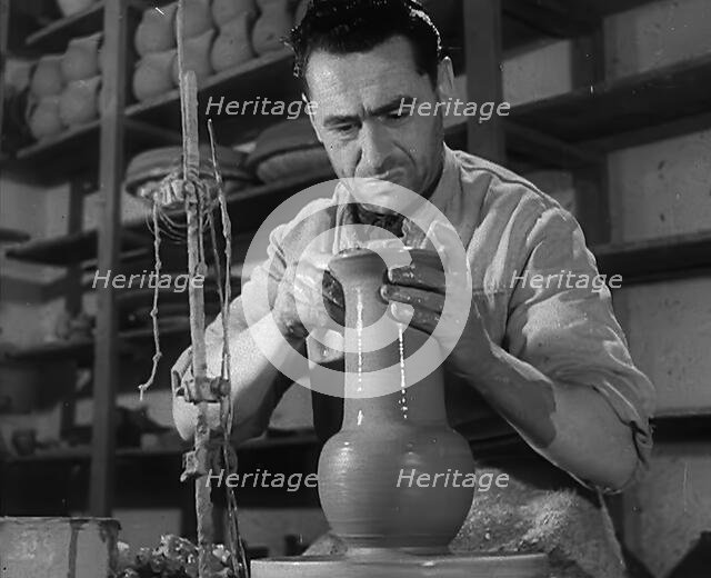 An Italian Worker Making Pottery, 1944. Creator: British Pathe Ltd.