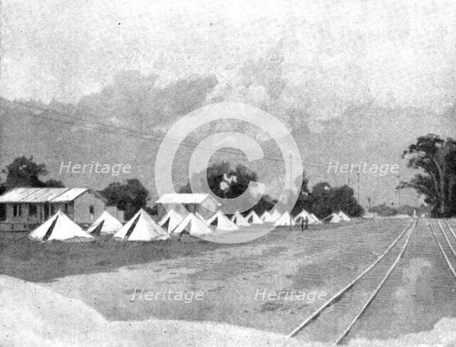 Reinforcements for Uganda: arrival of an Indian Contingent at Mombasa - the departure camp..., 1898. Creator: George Montbard.
