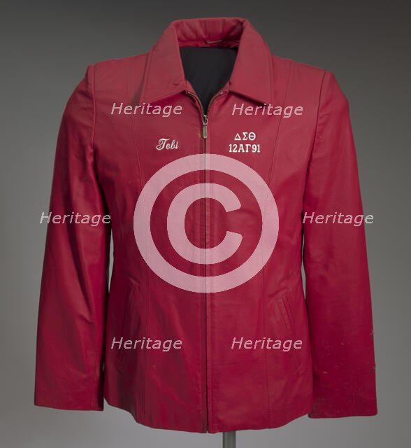 Red leather Delta Sigma Theta jacket owned by Tobi Douglas A. Pulley, 1991. Creator: La-Rose.