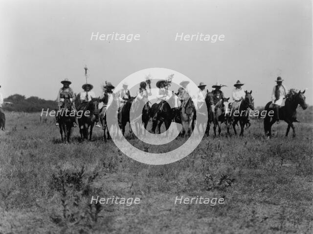 Chiefs in the Sun Dance parade-Cheyenne, c1927. Creator: Edward Sheriff Curtis.
