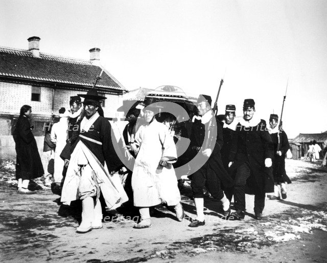 Japanese officials and soldiers, Korea, 1900. Artist: Unknown