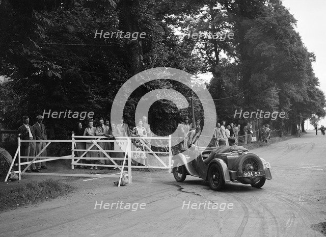 WH Scriven's Austin 7 Grasshopper, winner of a silver award at the MCC Torquay Rally, July 1937. Artist: Bill Brunell.