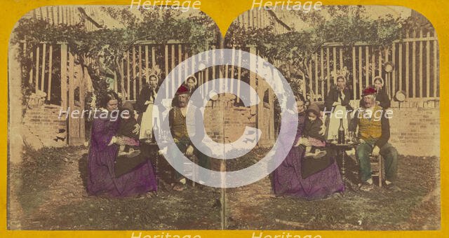Genre scene: family seated outside around a table with glasses and a bottle of wine, about 1860. Creator: London Stereoscopic & Photographic Co.
