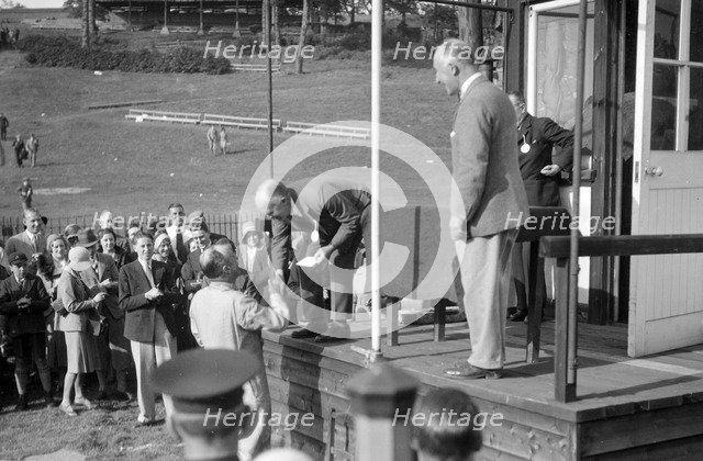 Earl Howe at the BARC Meeting, Brooklands, 25 May 1931. Artist: Bill Brunell.