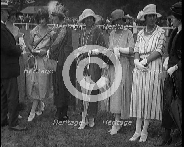 A Group of Female Civilians Dressed Glamorously at a Horse Racing Event, 1920. Creator: British Pathe Ltd.