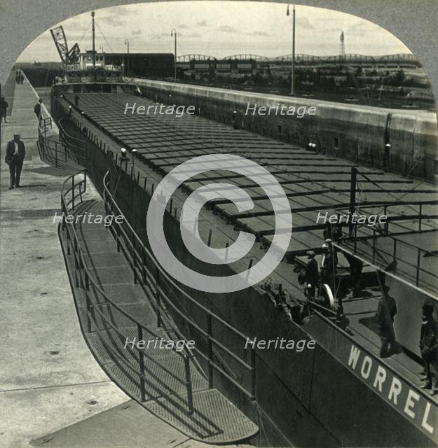 'Large Iron Ore Boat Coming into Sabin Locks. Sault Ste. Marie, Mich.', c1930s. Creator: Unknown.