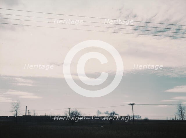 A train being pushed over the hump at the Proviso yard, C & NW RR., Chicago, Ill., 1942. Creator: Jack Delano.