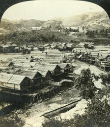'The Village of Ela-Varia, British New Guinea', c1909.  Creator: George Rose.
