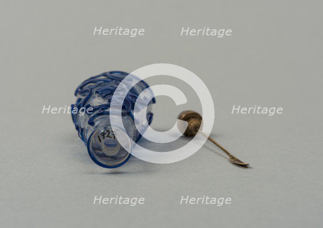Clear glass snuff bottle with blue overlay, China, Qing dynasty, 1644-1911. Creator: Unknown.