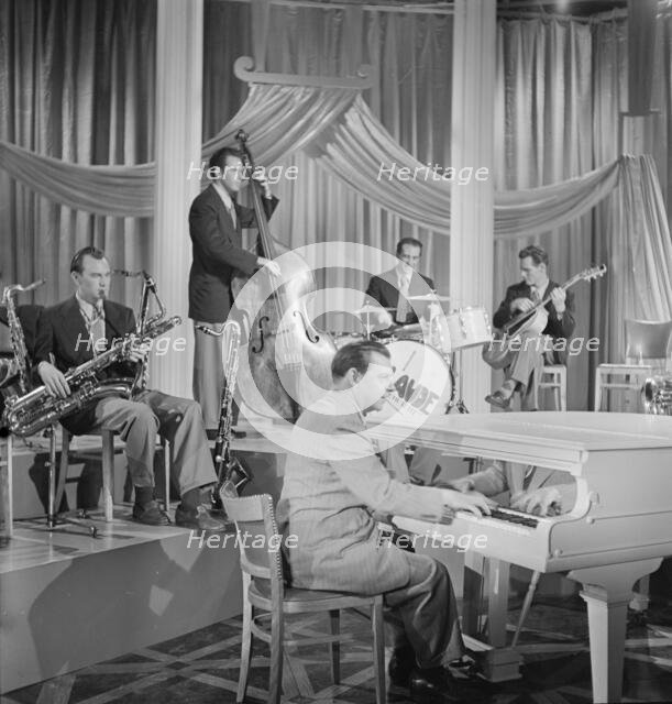 Portrait of Micky Folus, Joe Shulman, Claude Thornhill, Billy Exiner...Beautiful Doll, N.Y., 1947. Creator: William Paul Gottlieb.