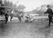 Horse Shows - Victor Mather Falling From 'Pagan Kin', 1912. Creator: Harris & Ewing.
