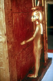 Selket protective goddess guarding the Canopic Shrine, Tomb of Tutankhamun, Cairo. Artist: Unknown