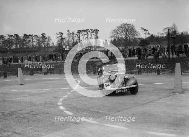 Talbot saloon competing in the JCC Rally, Brooklands, Surrey, 1939. Artist: Bill Brunell.