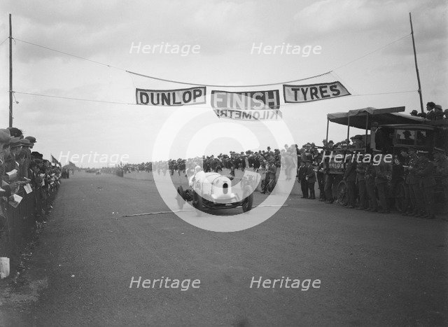 Bentley TT of Frank Clement at the finish of the Southsea Speed Carnival, Hampshire. 1922. Artist: Bill Brunell.