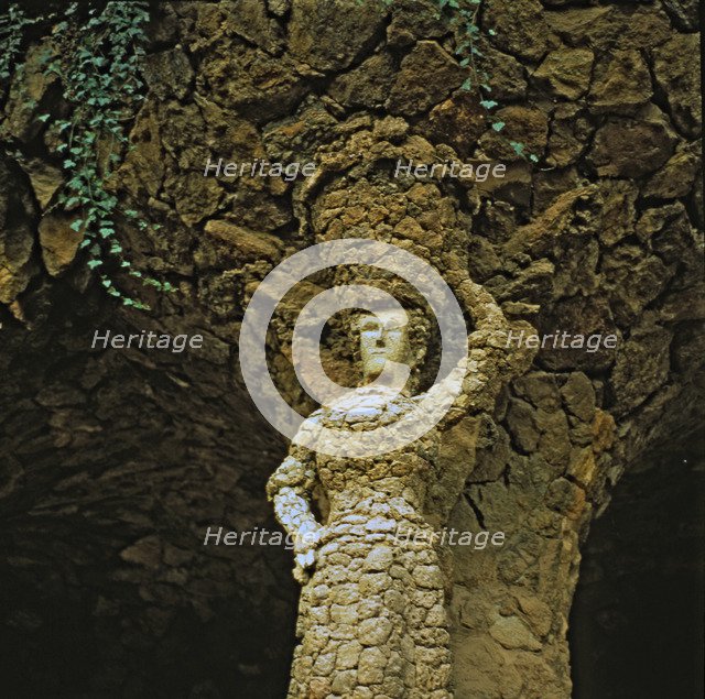 The Laundress', detail of the sculpture in one of the columns of the inside gallery of the Guell …