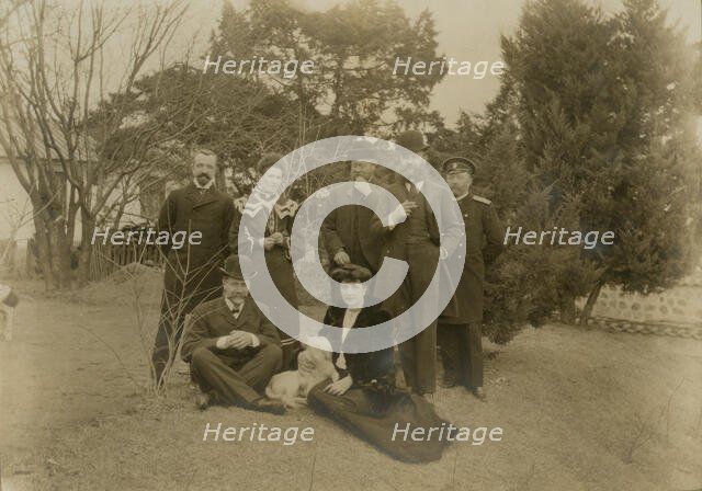 Russian Minister Pavlov and Mrs. Pavlov on Legation grounds at Seoul, c1904. Creator: Robert Lee Dunn.