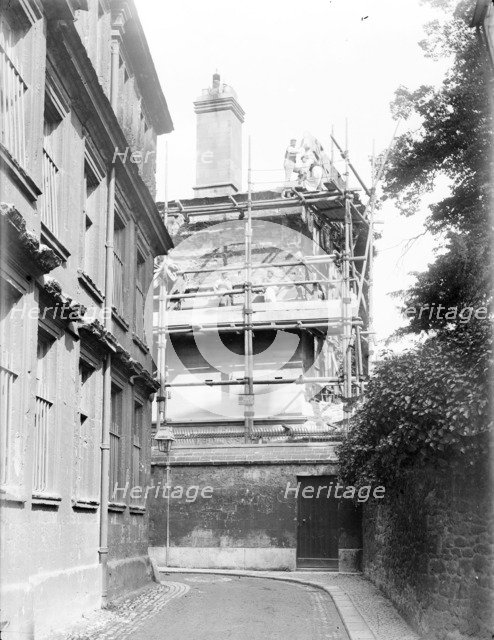 Workmen renovating the crumbling Headington stone, New College, Oxford, Oxfordshire, 1908. Artist: Henry Taunt