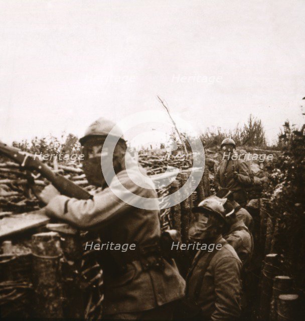 Gas alert in trenches, Champagne, northern France, 1916. Artist: Unknown.