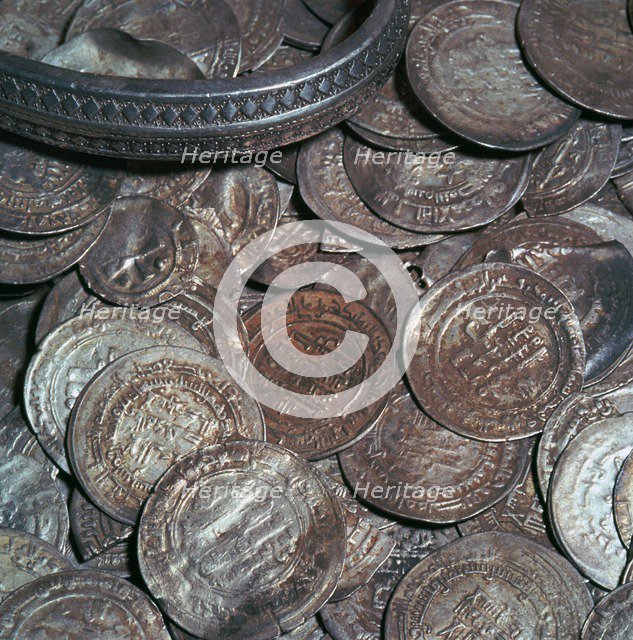 Hoard of silver with arab coins from a Viking grave. Artist: Unknown