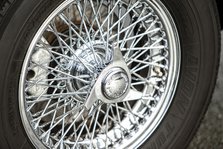 Spoked wheel of a 1965 Aston Martin DB5. Creator: Unknown.