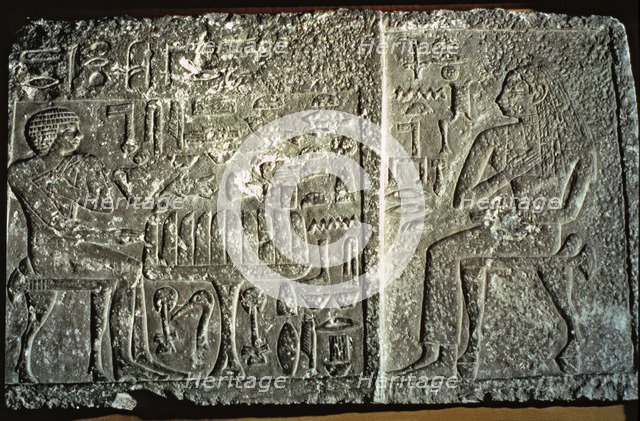 Engravings on a gravestone from the Giza Necropolis.